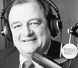 Moe Lauzier at a WRKO microphone